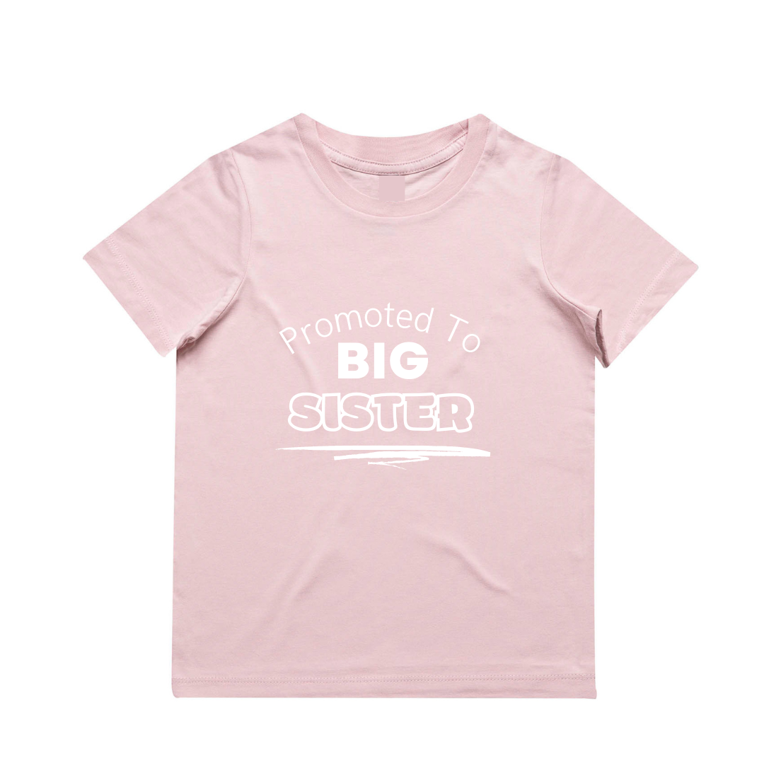 MLW By Design - Promoted To Big Sister Tee | Various Colours